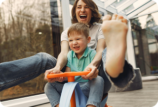Family enjoying their new home after receiving a housing offer image