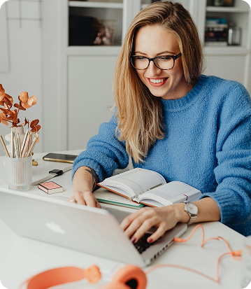 Applicant completing a housing application online on a laptop image