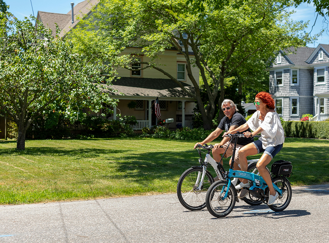 An old couple on bicycles